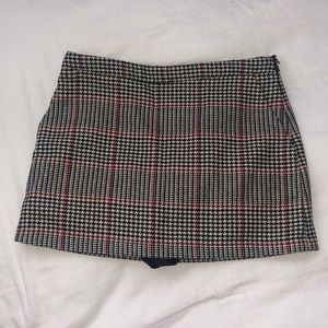 Plaid mini skirt with built-in shorts